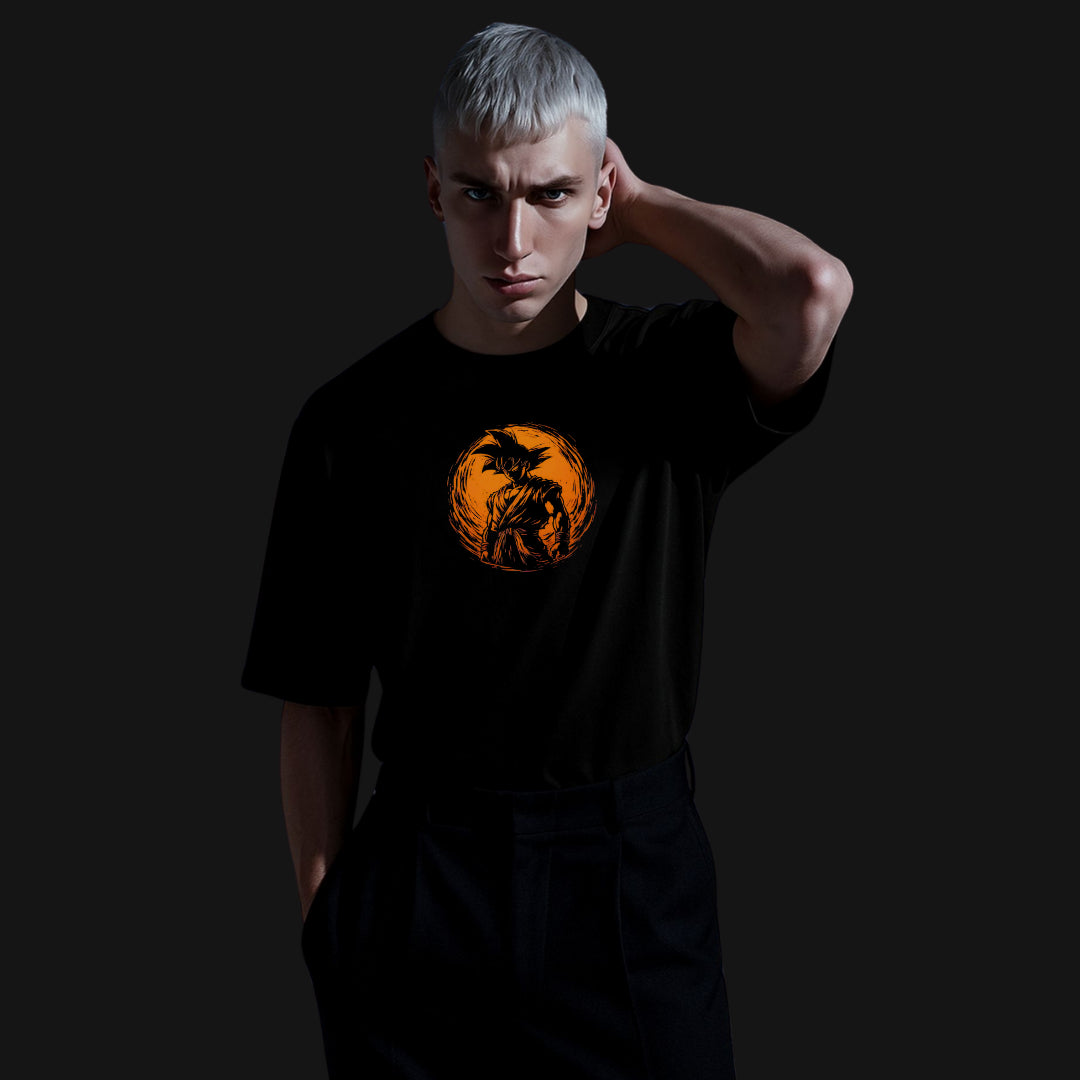Zenith Lifestyle oversized black Goku T-shirt with orange Dragon Ball design worn by male model