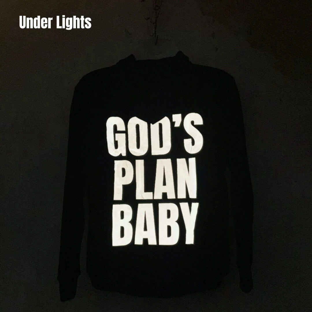Light Reflecting Unisex Hoodie featuring bold reflective text under lights for stylish night wear