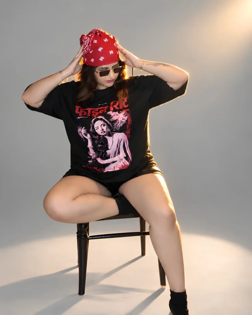 A model named Chitrarupa Banerjee is wearing the Fine Shit black oversized t-shirt from Zenith Lifestyle